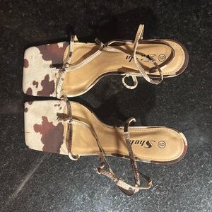 Cow print strappy heels